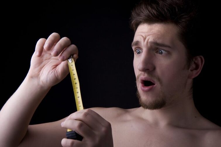 a man measured his penis before enlarging it with a pump